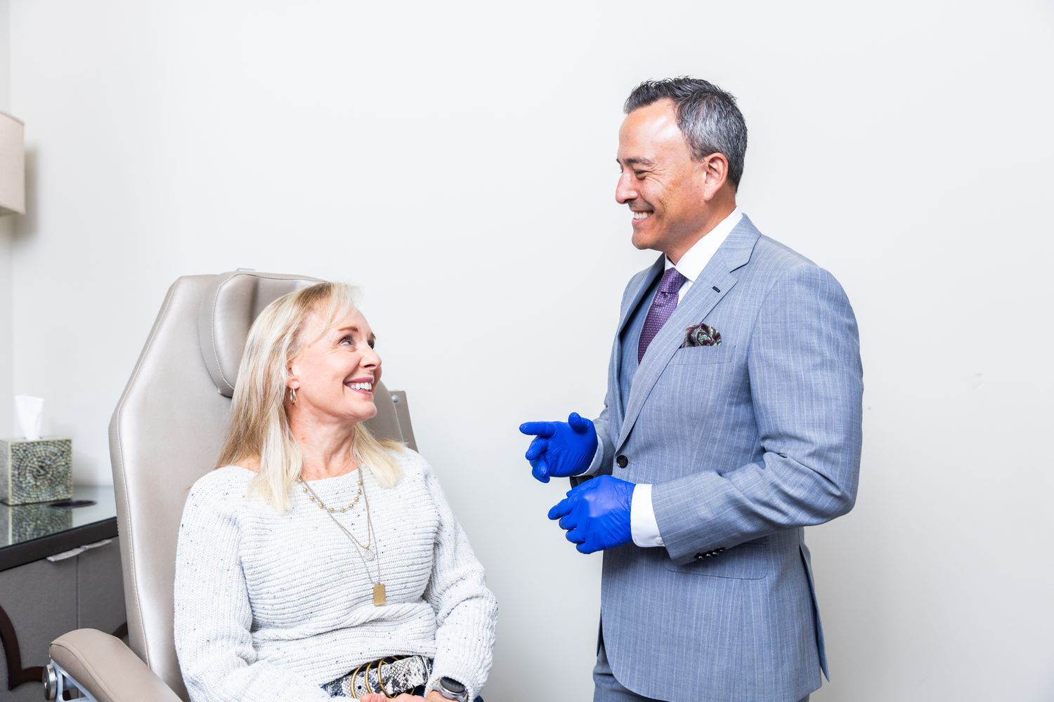 Sky Facial Plastic Surgery sign on display.